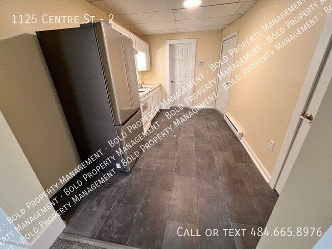 Building Photo - 1125 Centre St Unit 2 Rental
