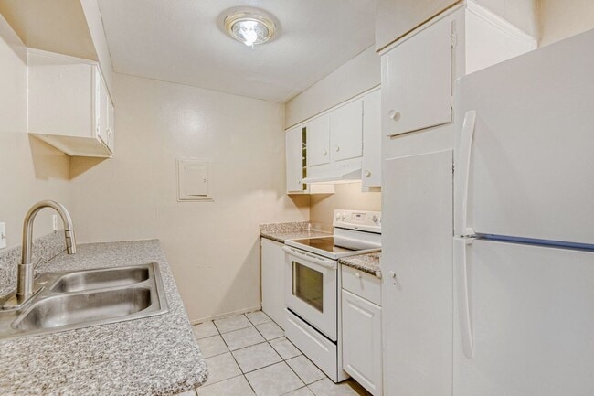 Building Photo - Spacious 2-Bed, 1-Bath with Open Concept & Natural Light