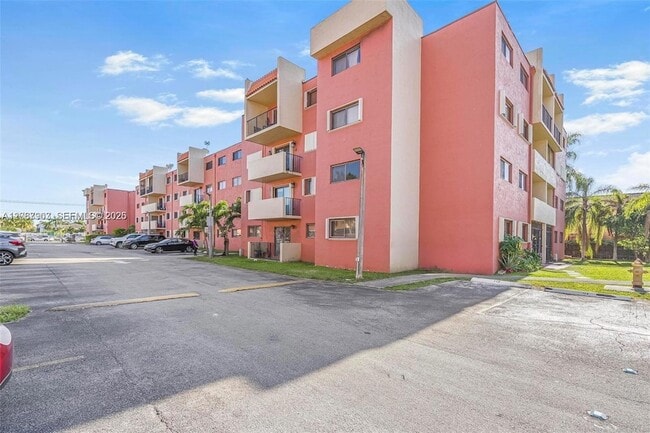 Building Photo - 8095 NW 8th St Unit 215
