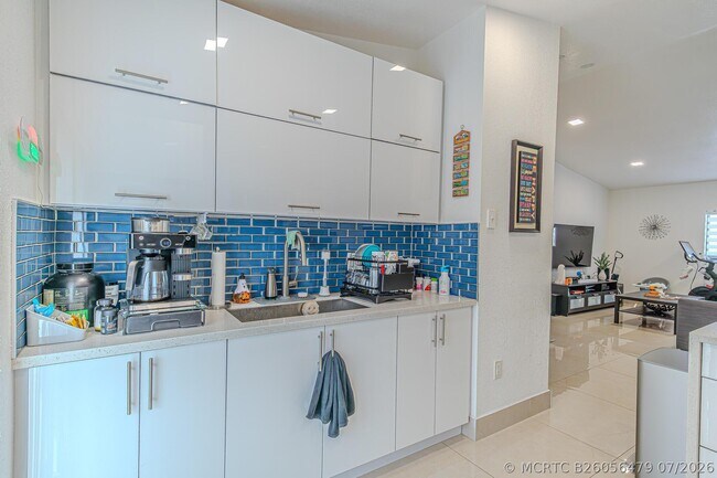 Building Photo - 7690 W 29th Way Unit 202