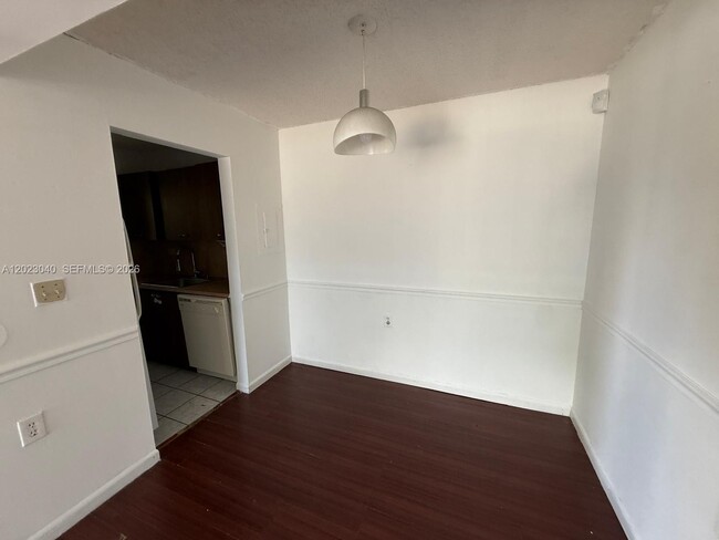 Building Photo - 6975 NW 179th St Unit 204