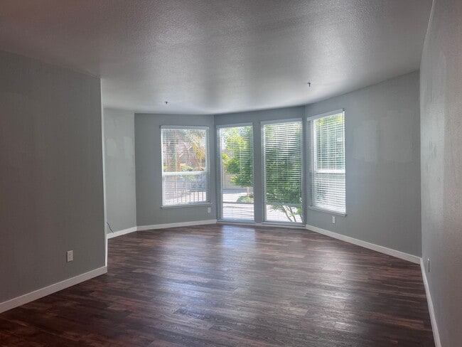 Photo - Spacious 1 Bedroom with Tons of Light, High Ceilings & Full Size Washer/Dryer Inside Unit 113