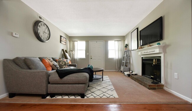 Living Room + Fireplace - British Woods Apartments