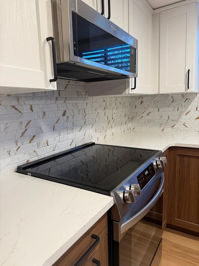 Photo - Newly Remodeled 1-Bed 1-Bath Townhome with Garage Parking – Available Now!