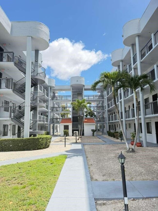 Building Photo - 5290 W 21st Ct Unit 301