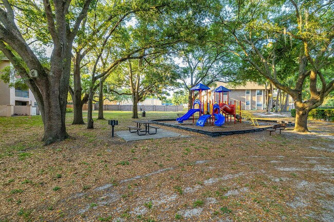 Experience outdoor family fun in this inviting playground surrounded by nature.