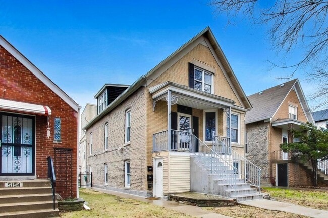 Building Photo - 5150 W Carmen Ave Unit 2