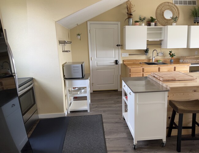 Open plan kitchen and dining - 15074 Lindark St Unit Loft Apartment