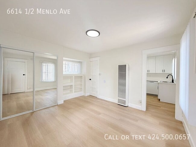Building Photo - 6614 1/2 Menlo Ave-