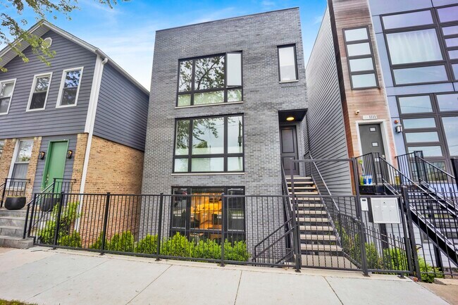 Building Photo - 1109 W 16th St Unit 1