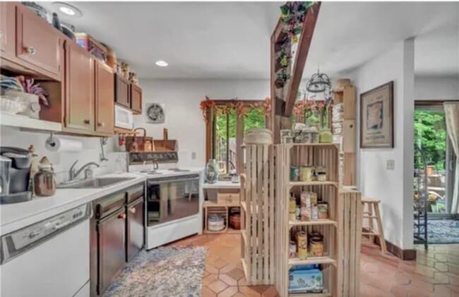 Kitchen has since been redone with new floors, countertops and cabinets