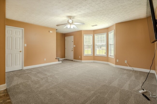 Photo - Spacious 4BR/3BA Townhome | Pet Friendly | Washer & Dryer Included | $1,600/mo