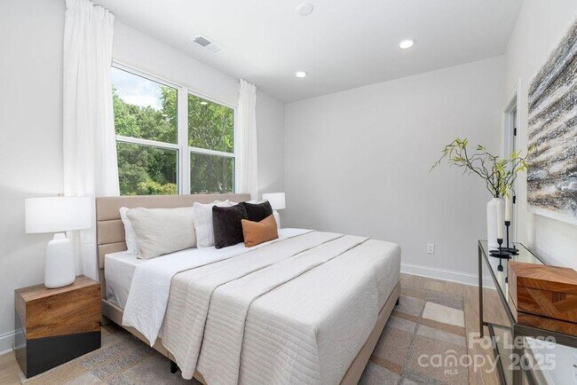 Photo - Brand New 3BR 3BA Home w/ Fenced Backyard • Quartz Island Kitchen in Charlotte