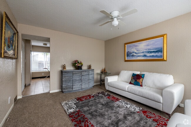 2BR, 1.5BA - 765SF - Living Room - Paradise Plaza Apartments