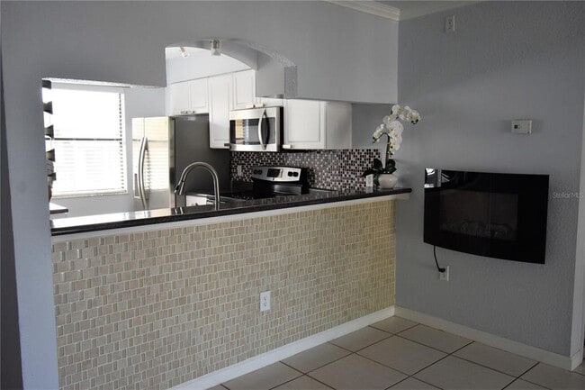 Photo - 10177 Sailwinds Blvd S Unit 203