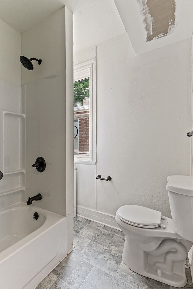 Photo - Spacious 5 Bedroom Home w/ Balcony, Porch & Yard Space!