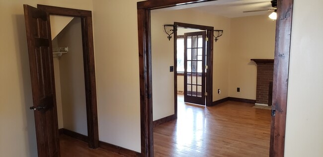 View from bedroom to living room, pocket doors - 87 Woodlawn St Unit 87 Woodlawn St