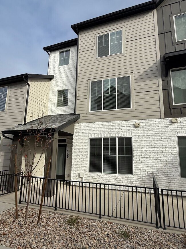 Building Photo - Half off first months rent - Beautiful townhome, construction just completed, 2 car garage, centr...