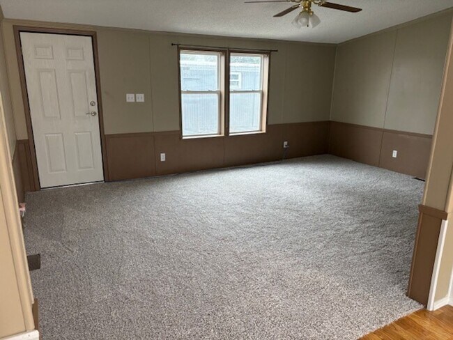 Photo - Spacious 4-Bedroom Home Available NOW in Skyway Park Village!