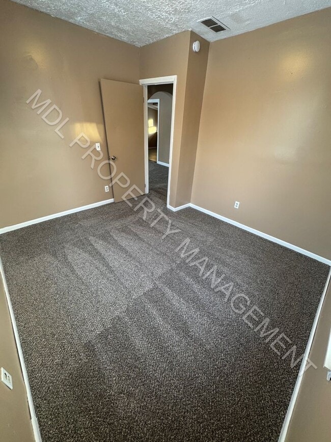 Photo - Charming 2-Bedroom Home with Bonus Room, Spacious Kitchen & Great Outdoor Space