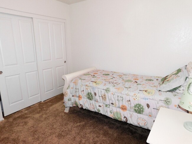 Secondary Bedroom with Double Closet Doors