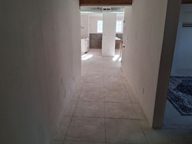 Photo - Large duplex with 3 car garage and made for blue collar folks.