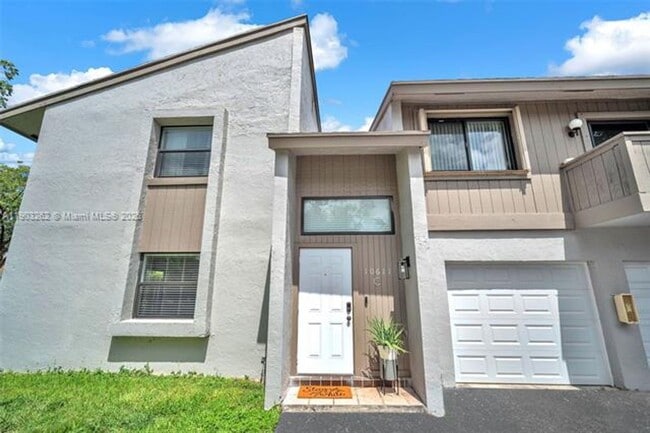 Building Photo - 10611 SW 113th Pl Unit 10611 SW 113th Pl 93-C