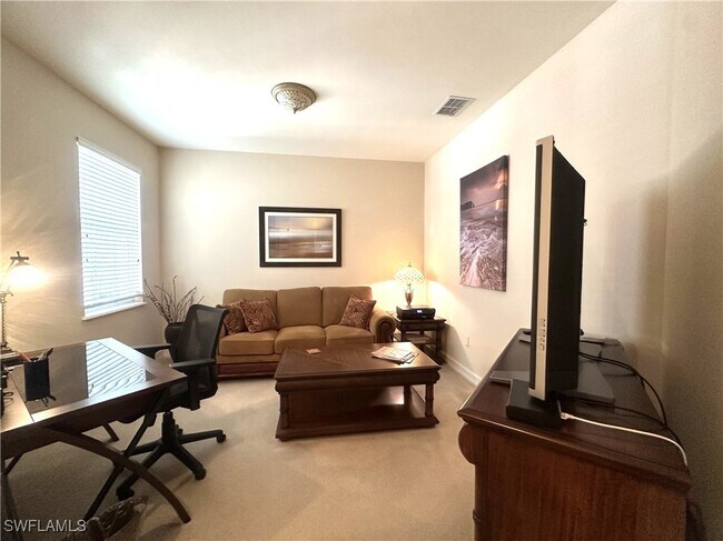 Building Photo - 1634 Tarpon Bay Dr S Unit 202 Rental