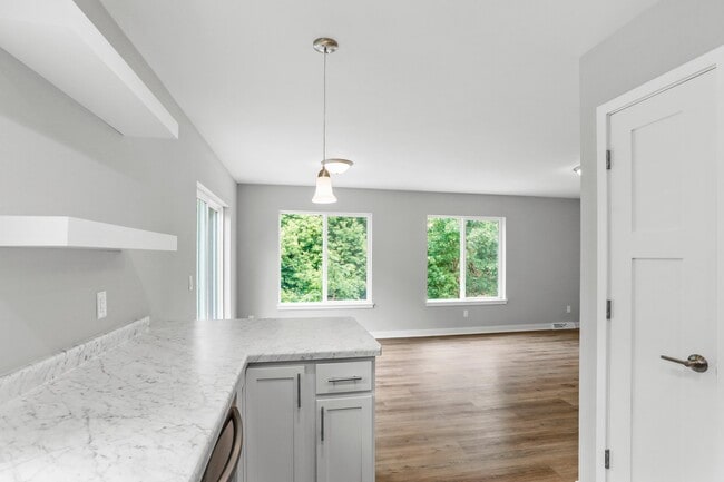 La cocina se integra con el comedor. - 200 Chalet Dr Unidad 200