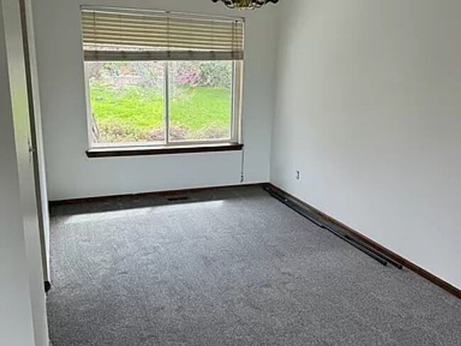 Photo - 4BR/4BA Updated Home with Finished Basement Suite & Landscaped Yard