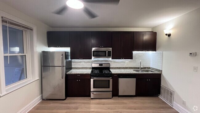 Building Photo - 2913 N Kedzie Ave Unit Garden Rental