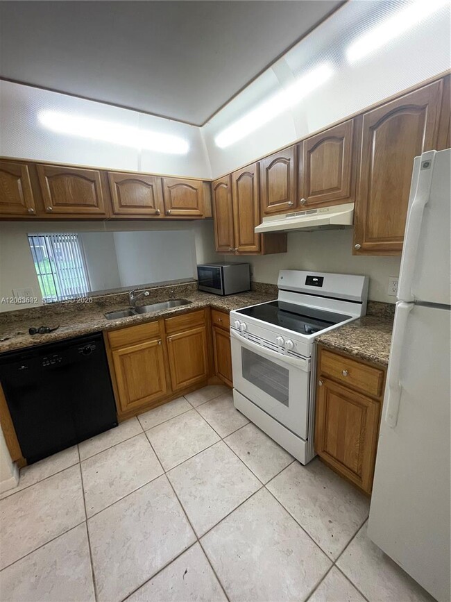 Photo - 6796 Palmetto Cir S Unit 101