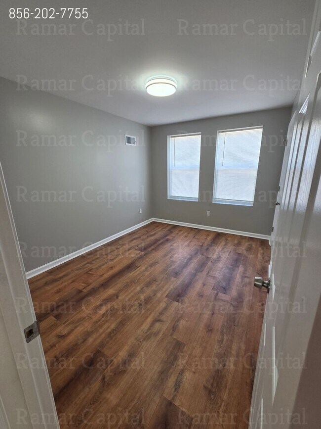 Photo - Charming 3-Bedroom Home with Spacious Gated Yard