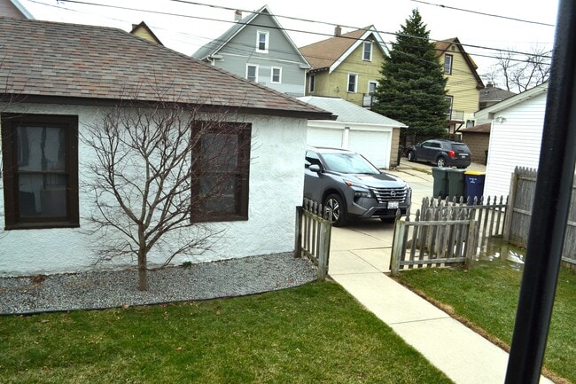 Garage plus slap parking - 1448 S 73rd St Unit 1448