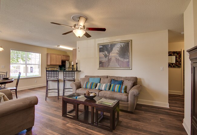 Our large living and dining areas feature open floor plans and ceiling fans