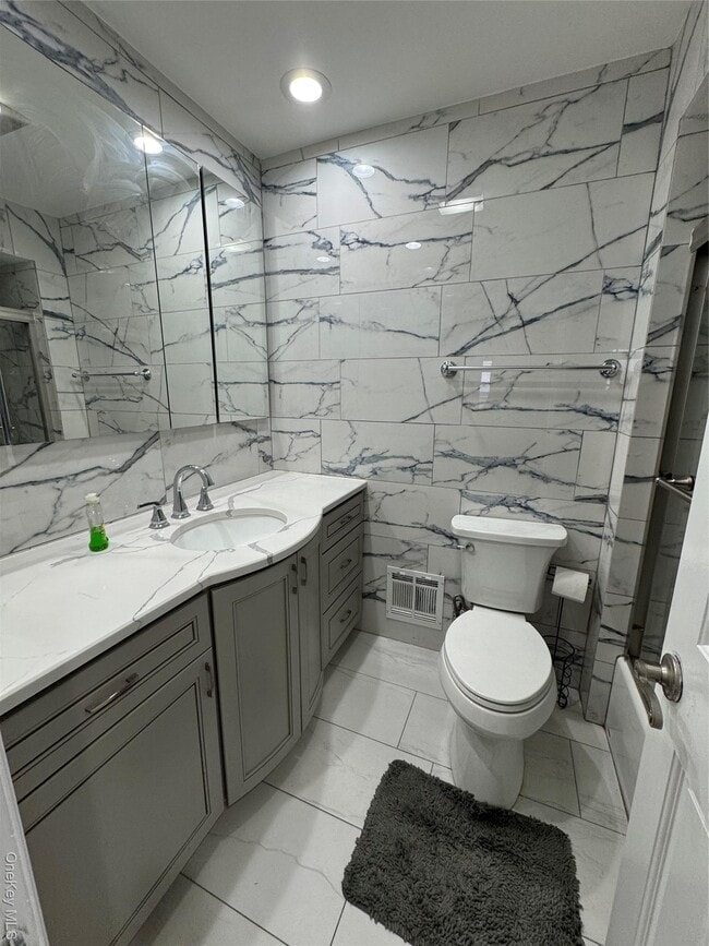 Photo - 144-05 21st Ave