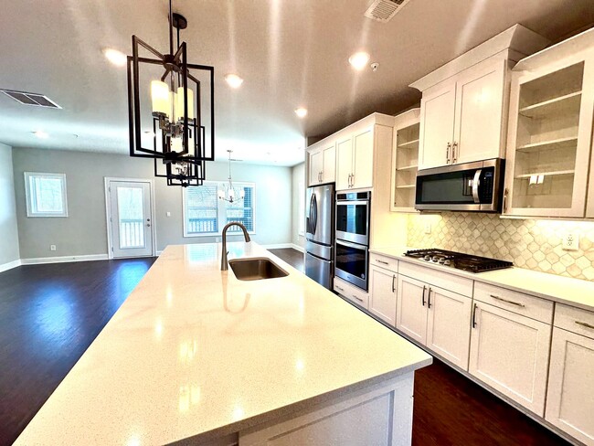 Photo - 4 bedroom, 3.5 bath townhouse in a swim community located in Woodstock, GA. Within walking distan...