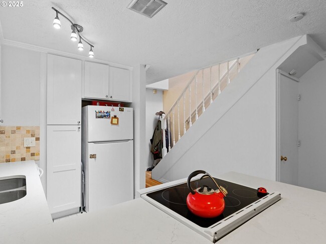 Photo - Bright & Inviting 2-Bed, 1.5-Bath with Modern Touches and Private Upstairs Retreat