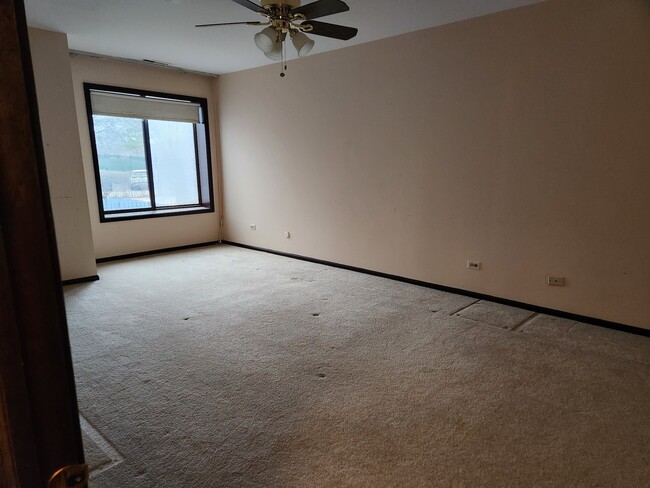 Photo - 9242 Gross Point Rd Unit 107