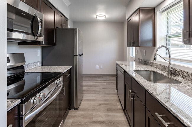 2BR, 1BA - 825SF - Kitchen - Homestead Village Townhomes