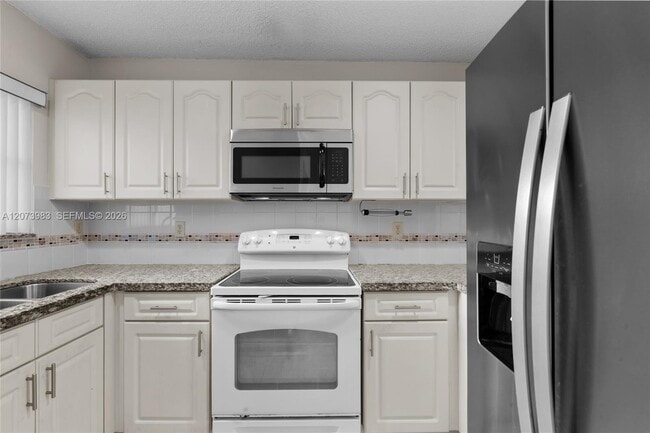Photo - 330 NW 114th Ave Unidad 7-105