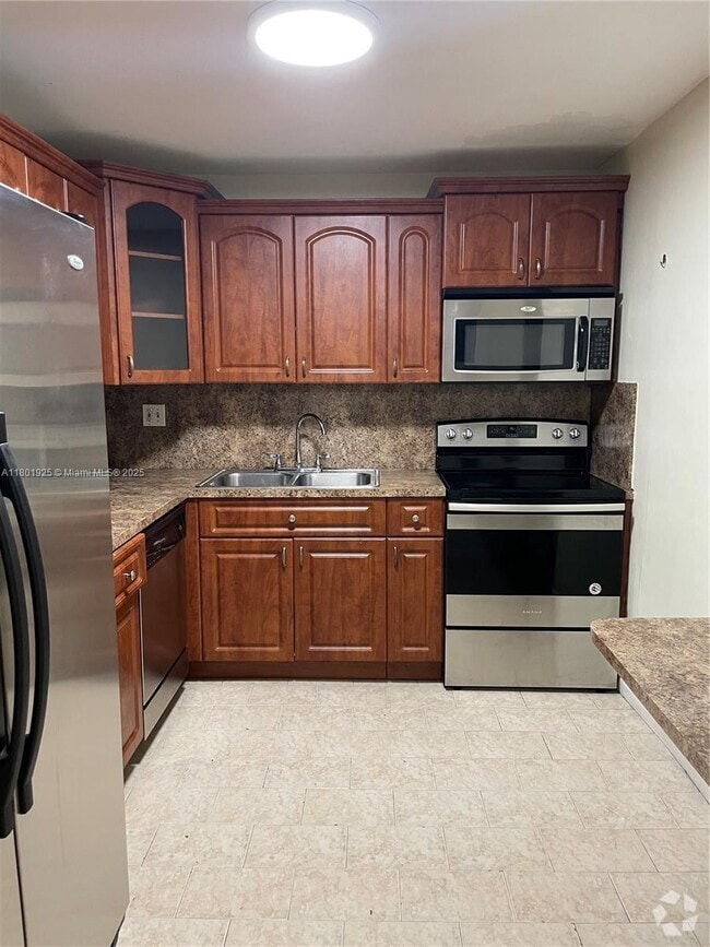 Building Photo - 14150 SW 84th St Unit 208-I Rental