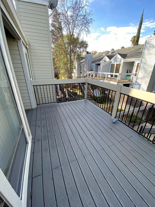 Photo - Bright Vaulted-Ceiling Condo in Gated Community • Pool • W/D Included • Move-In Ready