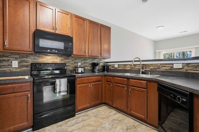 Photo - FULLY FURNISHED - Upgraded End-Unit Retreat | 3BR/2.5BA, Dedicated Office Space & Private Garage ...