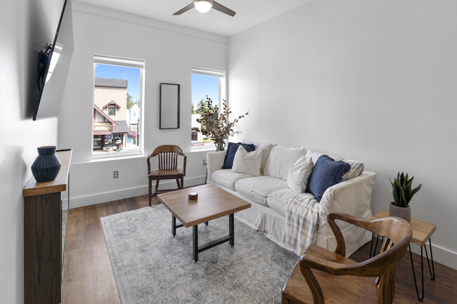 Living room - Pic is of a model unit. Actual unit may vary slightly - 133 W Main St Apartments