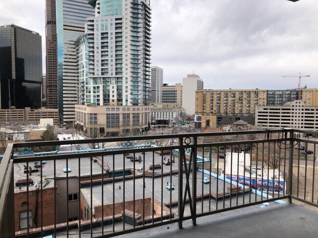 Building Photo - GORGEOUS NEW 7th FLOOR CONDO! CITY VIEWS, GARAGE + ALL UTILITIES INCL.