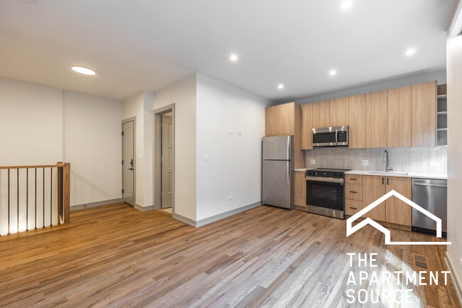 Building Photo - 1330 W Estes Ave Unit 1A