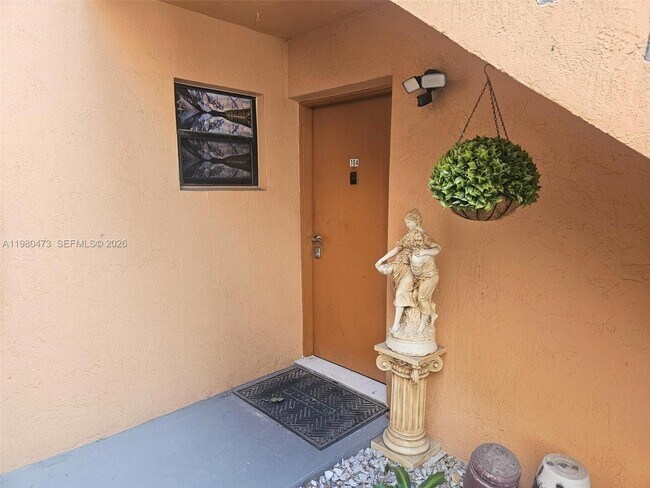 Building Photo - 6425 W 27th Ct Unit 104-6