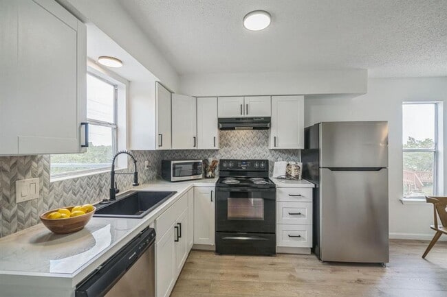 Photo - Rifle Bend Duplex Unit 6914 B Rifle Bend N/M