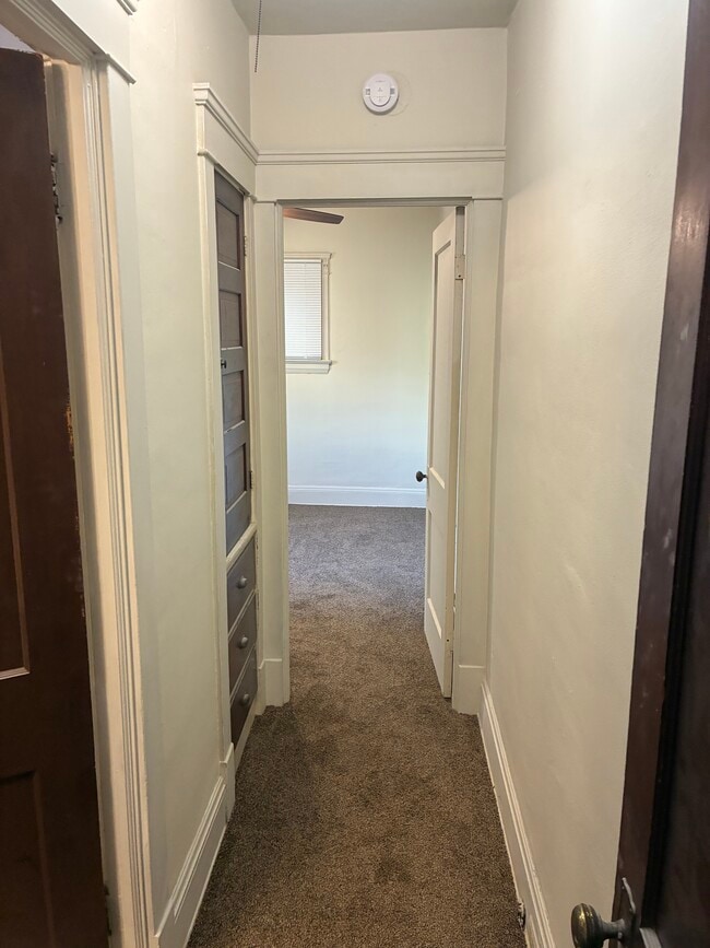 Hallway to bathroom and bedroom - all new paint and light fixtures - 18243 Sloane Ave Unit Apartment #1 Downstairs